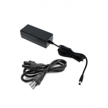 Adaptador de Corriente 9VDC...